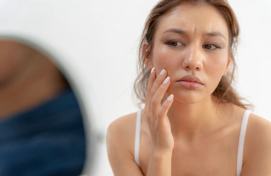 Woman worried about her face skin
