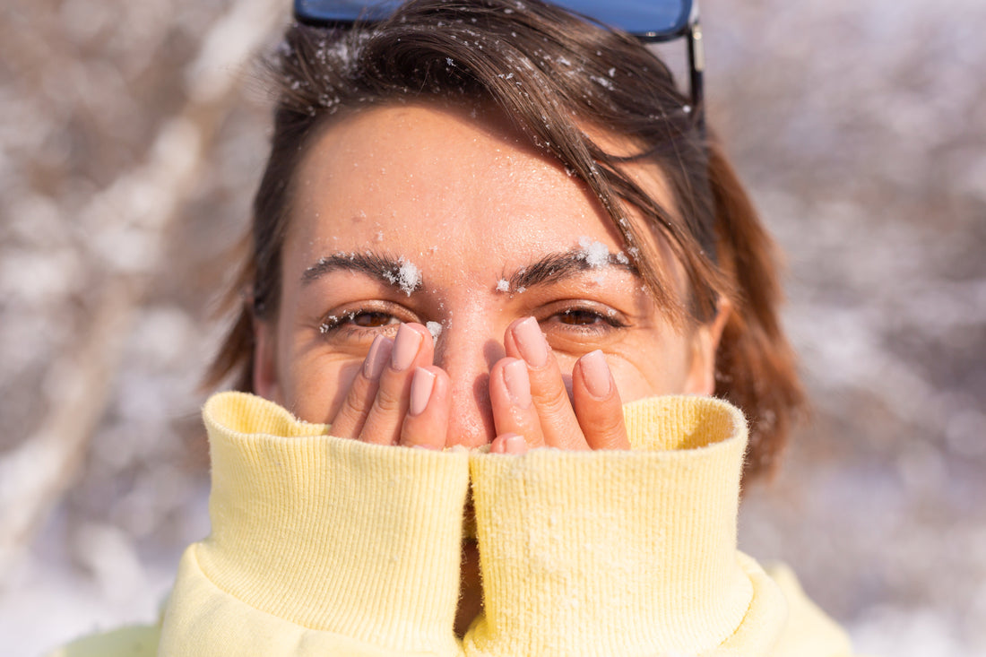 woman struggles with skin winter dryness