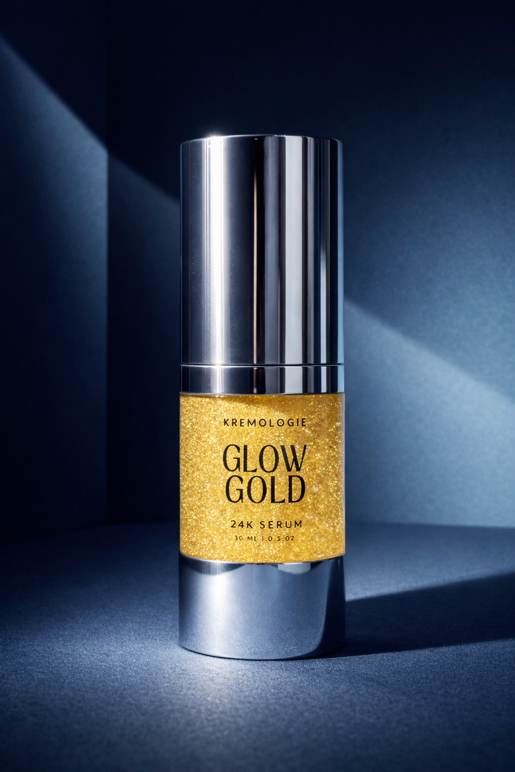 Kremologie Glow Gold 24k Serum bottle on a dark blue background